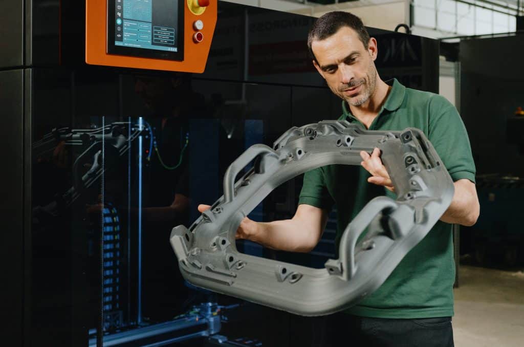 Large-scale 3D printers for additive manufacturing: design considerations  and challenges