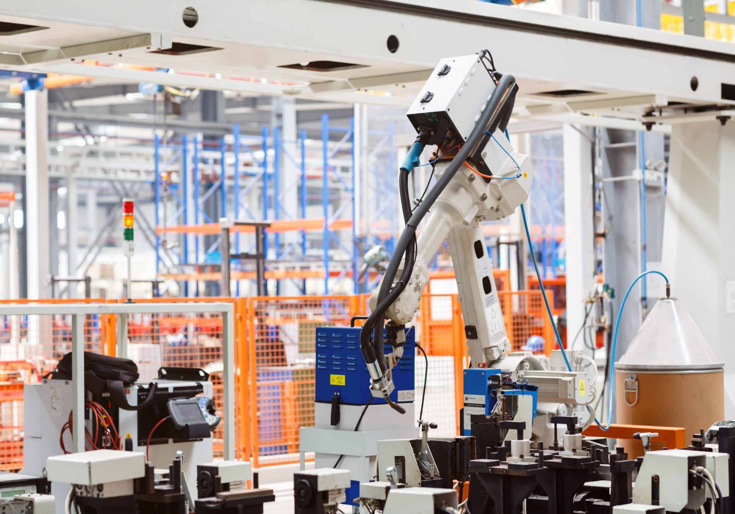 industrial-photo-of-robot-working-in-modern-factor-2023-11-27-05-20-17-utc